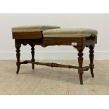 A quality Victorian rosewood duet stool, each seat with needlepoint upholstery worked in a floral
