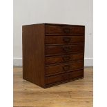 An early 20th century oak table top chest, fitted with six drawers each retaining their original