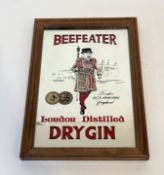 A collectable advertising Beefeater Gin mirror. (h-34cm w-24cm)