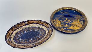 A French Quimper ware decorative slip ware platter (w- 38cm) and a Carlton Ware bowl decorated