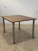 A Contemporary hardwood and tubular kitchen dining table, H73cm, 120cm x 93cm
