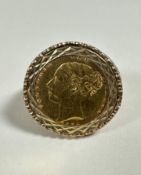 A Queen Victoria gold half sovereign, 1835, mounted in ring with diamond pattern mount and pierced