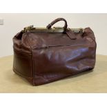 Texier, France - A Gladstone type leather bag, the interior with two zip pockets and one to exterior