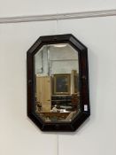 A 1930's oak framed wall hanging mirror 70cm x 46cm