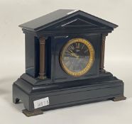 A Victorian slate mantel clock of architectural form, the case with cast columns and bracket