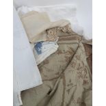 A large collection of various linens such as table cloths, hand stitched napkins/handkerchiefs,