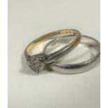 A 9ct white gold wedding band (M) (2.2g) and an 18ct yellow and white gold heart shaped diamond