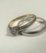 A 9ct white gold wedding band (M) (2.2g) and an 18ct yellow and white gold heart shaped diamond