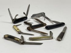 A collection of pocket knives to include; a Rodgers I*XL multi-tool pocket knife, a CK real lamb