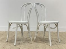 Ikea, a pair of Olga injection moulded white poly dining chairs, late 20th century, in the style