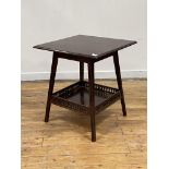 An Edwardian Arts and Crafts mahogany occasional table, the square moulded top raised on square