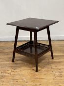 An Edwardian Arts and Crafts mahogany occasional table, the square moulded top raised on square