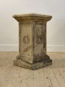 A 19th century neoclassical fire clay pedestal of rectangular outline, moulded with running leaf
