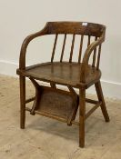 A 19th century ash and elm desk chair, the bentwood crest and arm rests over shaped seat, raised