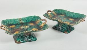 A pair of 19thc Bellfield Pottery leaf moulded two handled comports decorated with green, brown