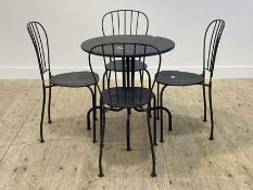 A black painted aluminium garden suite, comprising a table with circular top and four inverted