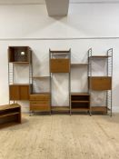 Staples, A mid century Ladderax modular five bay wall unit, including a variety of cabinets and open