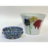 A studio pottery dish decorated with gilding, blue and red speckled glazing (w-20cm) and a Janice