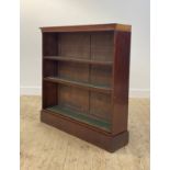 A 19th century mahogany country house floor standing open bookcase, with two baize lined