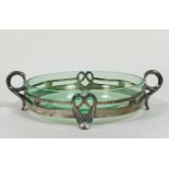 An Art Nouveau WMF pewter serving dish with twin loop handles to side and scrolling mounted lily