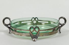 An Art Nouveau WMF pewter serving dish with twin loop handles to side and scrolling mounted lily