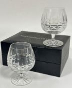 A pair of Waterford Irish Crystal brandy snifters with slice cut decoration (13cm x base: 8cm),