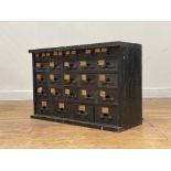 A scratch built pine machinists or collectors table top chest of drawers, early to mid 20th century,