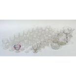 A large collection of various glassware comprising four thumb cut white wine glasses, seventeen
