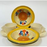 Clarice Cliff for Wilkinson Ltd, three 'Bizarre' 'Crocus' pattern bowls in yellow/orange/green (