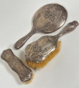An Edwardian Chester Art Nouveau style hairbrush and hand brush with engraved cypher GSR and