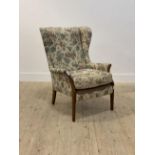 Parker Knoll, a 1960's upholstered wingback chair, H94cm, W67cm, D71cm