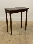 An early to mid 20th century oak side table, on square tapered supports. H74cm, W64cm, D35cm
