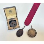 Three medals, a Dux medal 1915, Guild of St Barnabas on ribbon and a Dundee Royal Infirmary medal in