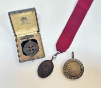 Three medals, a Dux medal 1915, Guild of St Barnabas on ribbon and a Dundee Royal Infirmary medal in