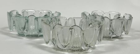 A set of three Scandinavian textured clear glass vases of abstract design (h- 7cm, w- 16cm) (3)