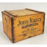 A John Haig's Scotch Whisky case with side handles, hinged lid and 12 inner compartments, the