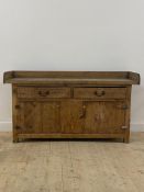 A 19th century and later pine and fruit wood kitchen sideboard, the galleried top over two drawers