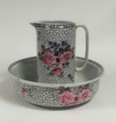 A Royal Staffordshire Pottery wash basin (w- 40cm) and water jug (h- 30cm) decorated with roses