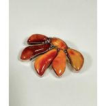 A Continental 925 standard amber panel brooch in the Art Nouveau style, with beaded fronds, with