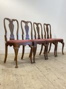 A set of four early 20th century walnut Queen Anne style dining chairs, with splat back over drop in
