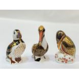 A trio of Royal Crown Derby bone China paperweights comprising a brown Pelican (h- 14cm), a