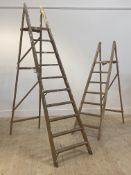 A graduated pair of vintage beech decorators step ladders larger H217cm