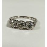 An 18ct white gold three stone old cut diamond ring mounted in claw setting (each stone: 0.2ct) (