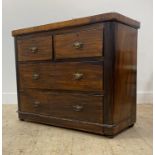 An early 20th century stained walnut and pine chest fitted with two short and three long graduated