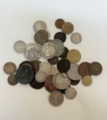 A small mix of coins, British and Continental includes 7 shillings, face pre-1920 and a nice Italy
