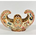 A Hungarian Zsolnay Pecs cornucopia style scrolling pierced dish with centre pierced panel with