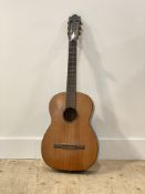 A Vintage six string acoustic guitar, paper label to interior inscribed Adolf Meinel
