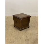 A 19th century mahogany coal box of square tapered outline, hinged lid enclosing interior with