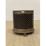 A Regency style steel cylindrical planter or wave paper basket, with metal insert and standing on