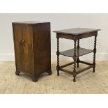 An oak sheet music cabinet, circa 1930's, with quarter sawn veneers, two panelled doors enclosing